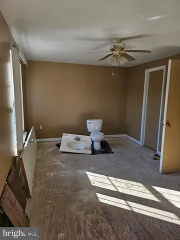 a view of a house with washer and dryer