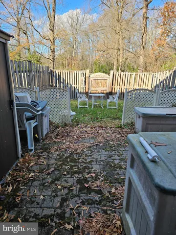 a view of a backyard with a deck
