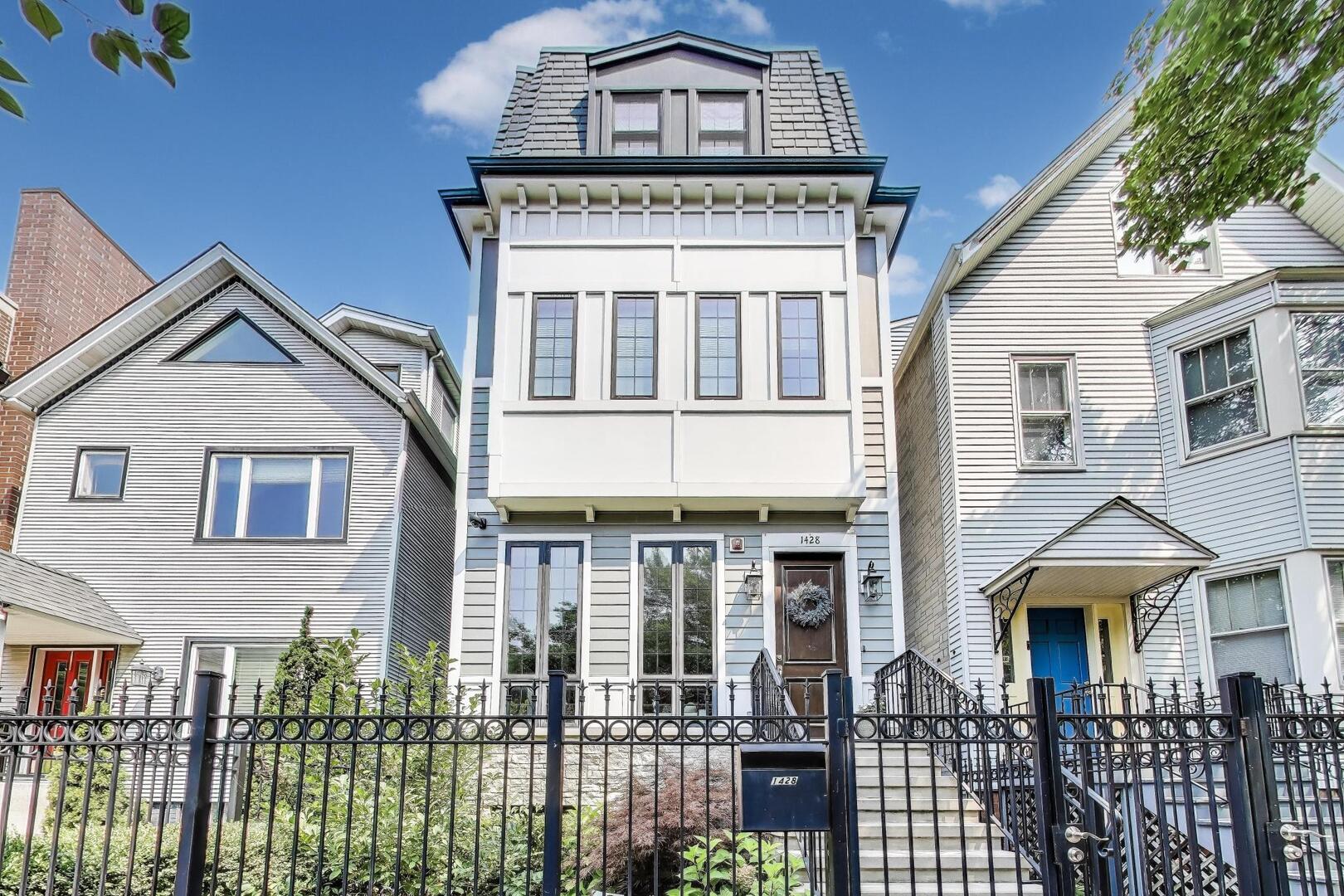 1428 West George Street Chicago, IL 60657 - Photo 1 of 66 a front view of a house