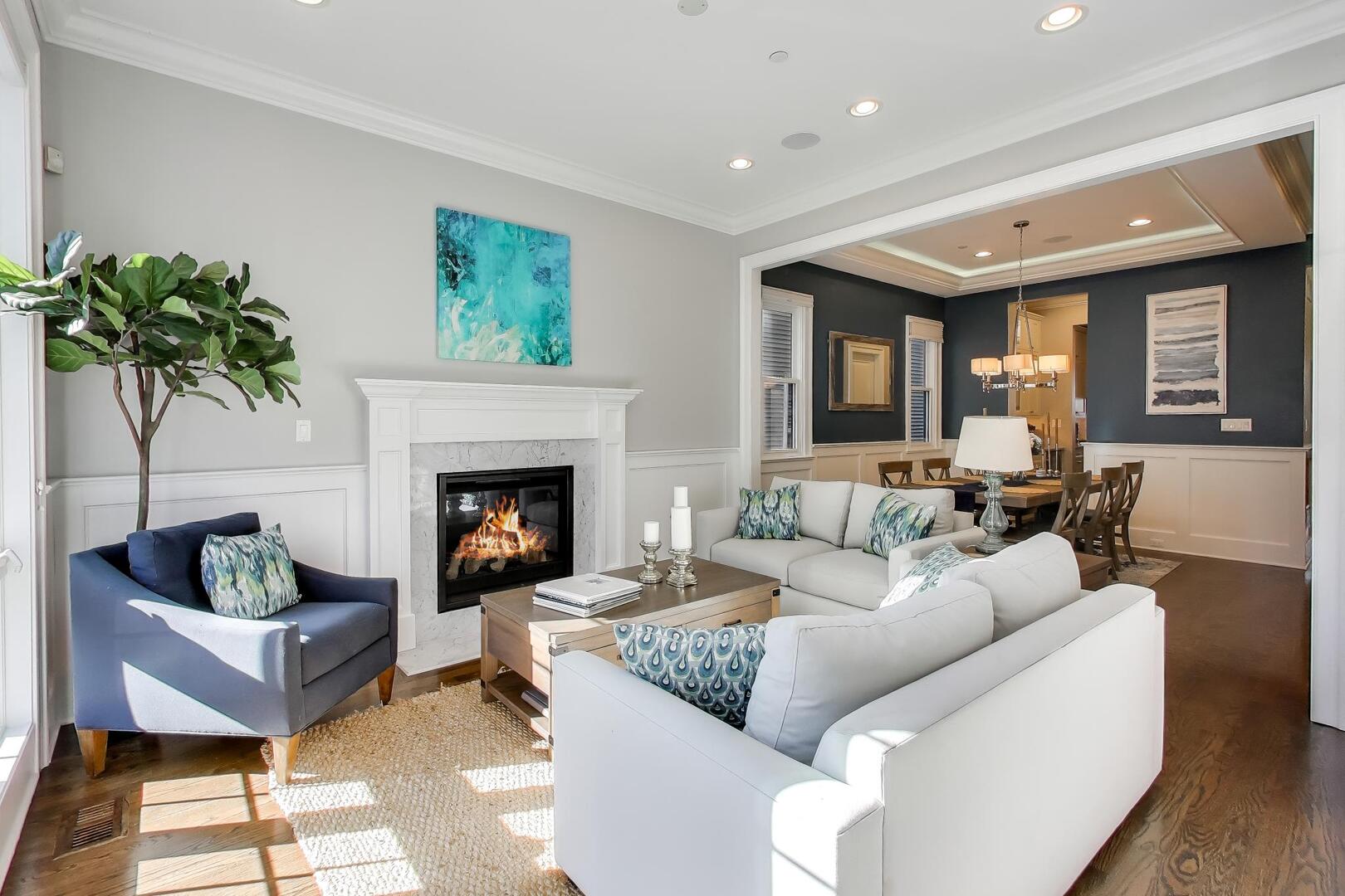 1428 West George Street Chicago, IL 60657 - Photo 2 of 66 a living room with furniture and a fireplace