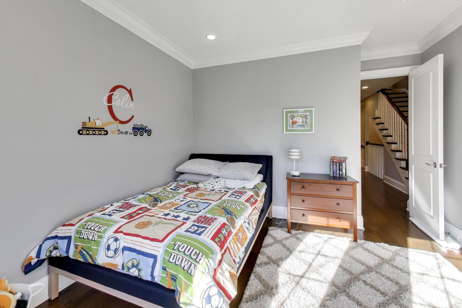 1428 West George Street Chicago, IL 60657 - Photo 29 of 66 a bedroom with a bed and a window