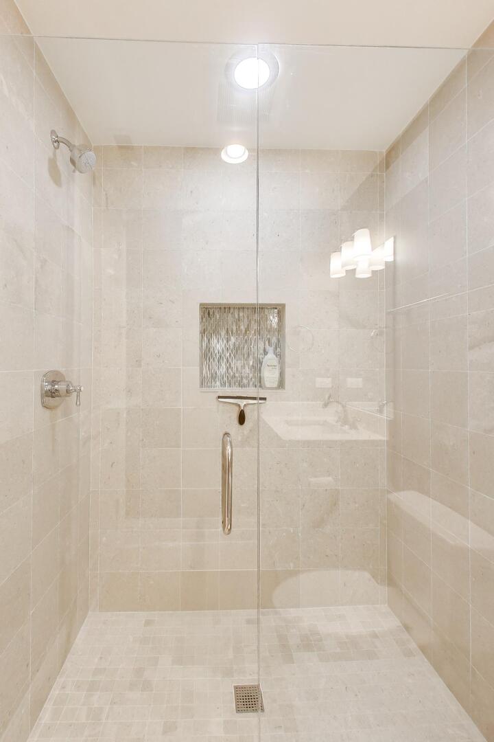 1428 West George Street Chicago, IL 60657 - Photo 31 of 66 a bathroom with a shower