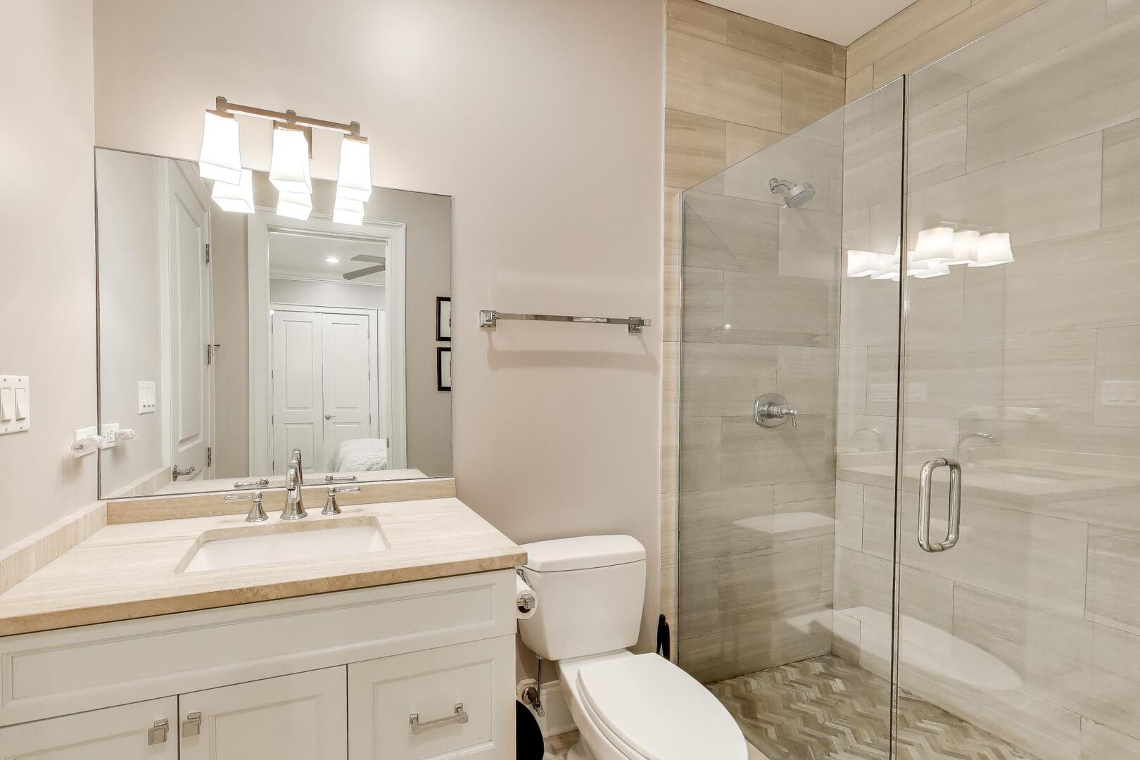 1428 West George Street Chicago, IL 60657 - Photo 54 of 75 a bathroom with a sink a toilet and shower