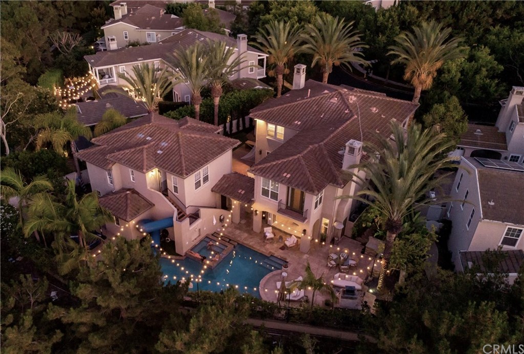 26 Seabluff Newport Beach, CA 92660 - Photo 1 of 59 an aerial view of multiple houses with yard