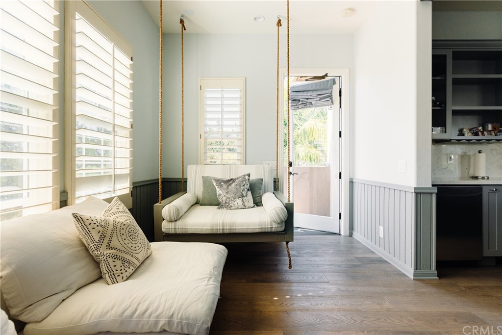 26 Seabluff Newport Beach, CA 92660 - Photo 49 of 59 a living room with furniture and a large window
