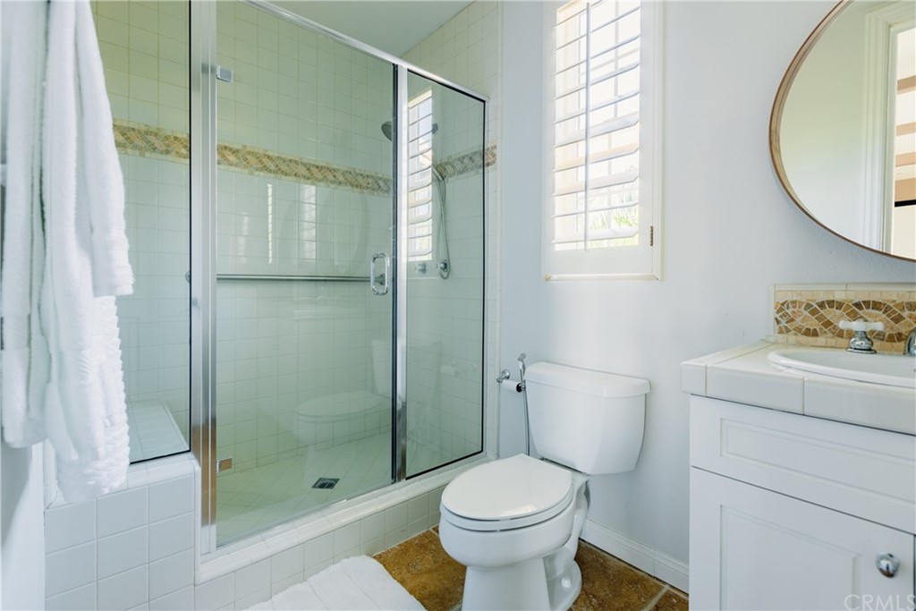 26 Seabluff Newport Beach, CA 92660 - Photo 53 of 59 a bathroom with a toilet and a shower