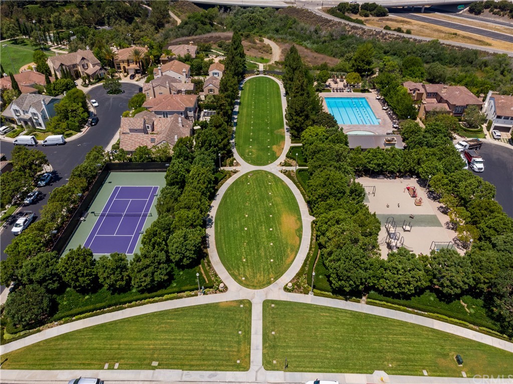26 Seabluff Newport Beach, CA 92660 - Photo 59 of 59 an aerial view of a house with garden space and trees