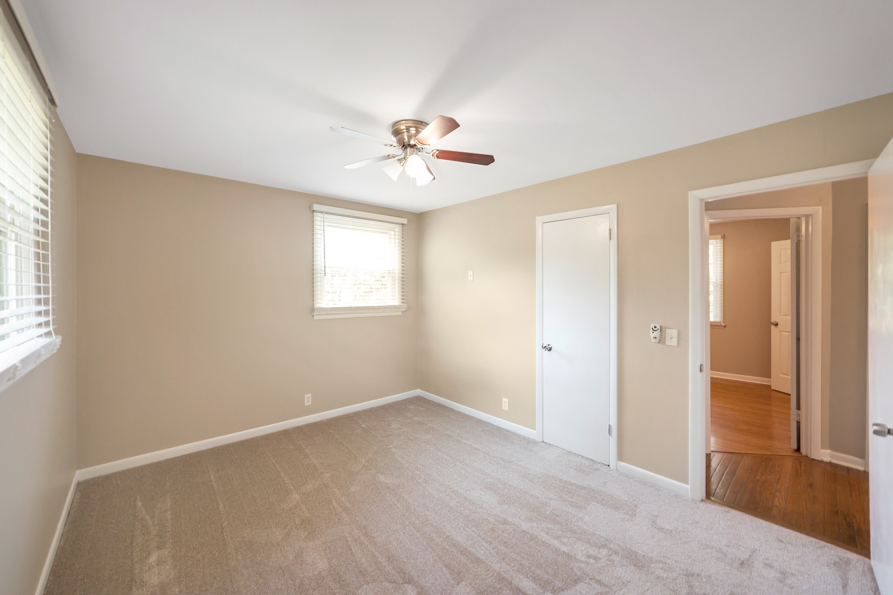 7880 Saundersville Road Mount Juliet, TN 37122 - Photo 12 of 24 wooden floor in an empty room with a window