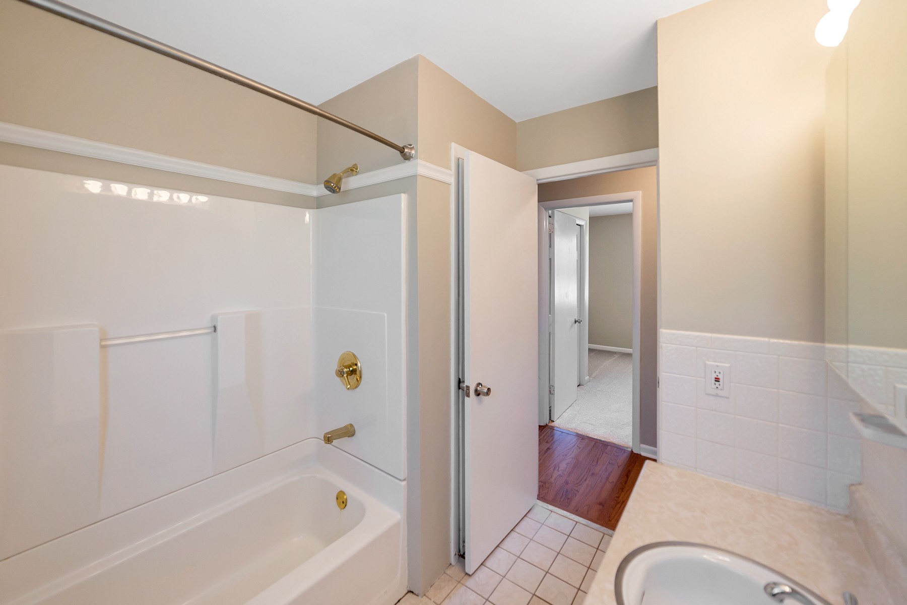 7880 Saundersville Road Mount Juliet, TN 37122 - Photo 14 of 24 a bathroom with a bathtub and a shower