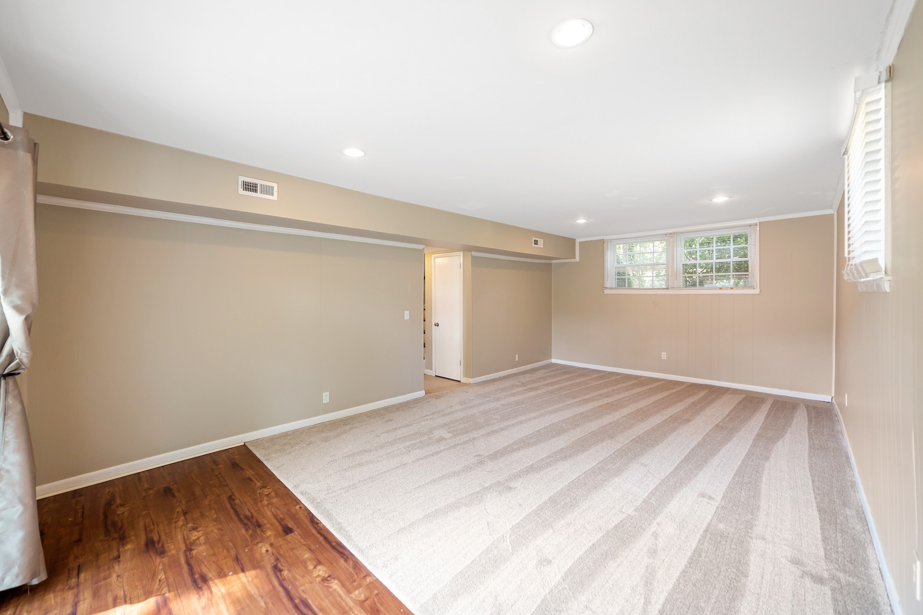 7880 Saundersville Road Mount Juliet, TN 37122 - Photo 17 of 24 a view of empty room with wooden floor and fan
