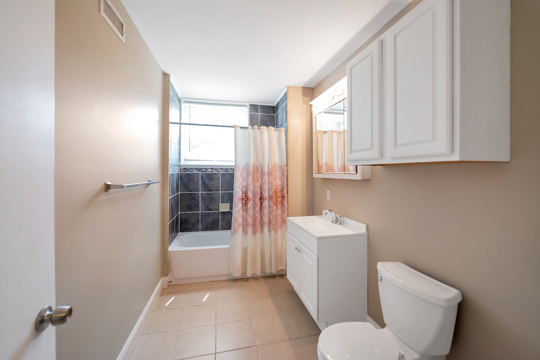 7880 Saundersville Road Mount Juliet, TN 37122 - Photo 18 of 24 a bathroom with a sink toilet and shower