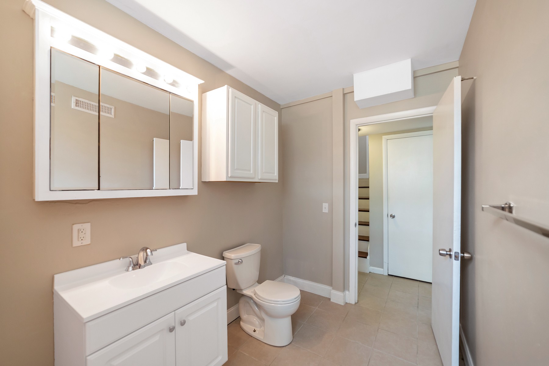 7880 Saundersville Road Mount Juliet, TN 37122 - Photo 19 of 24 a bathroom with a toilet sink and mirror