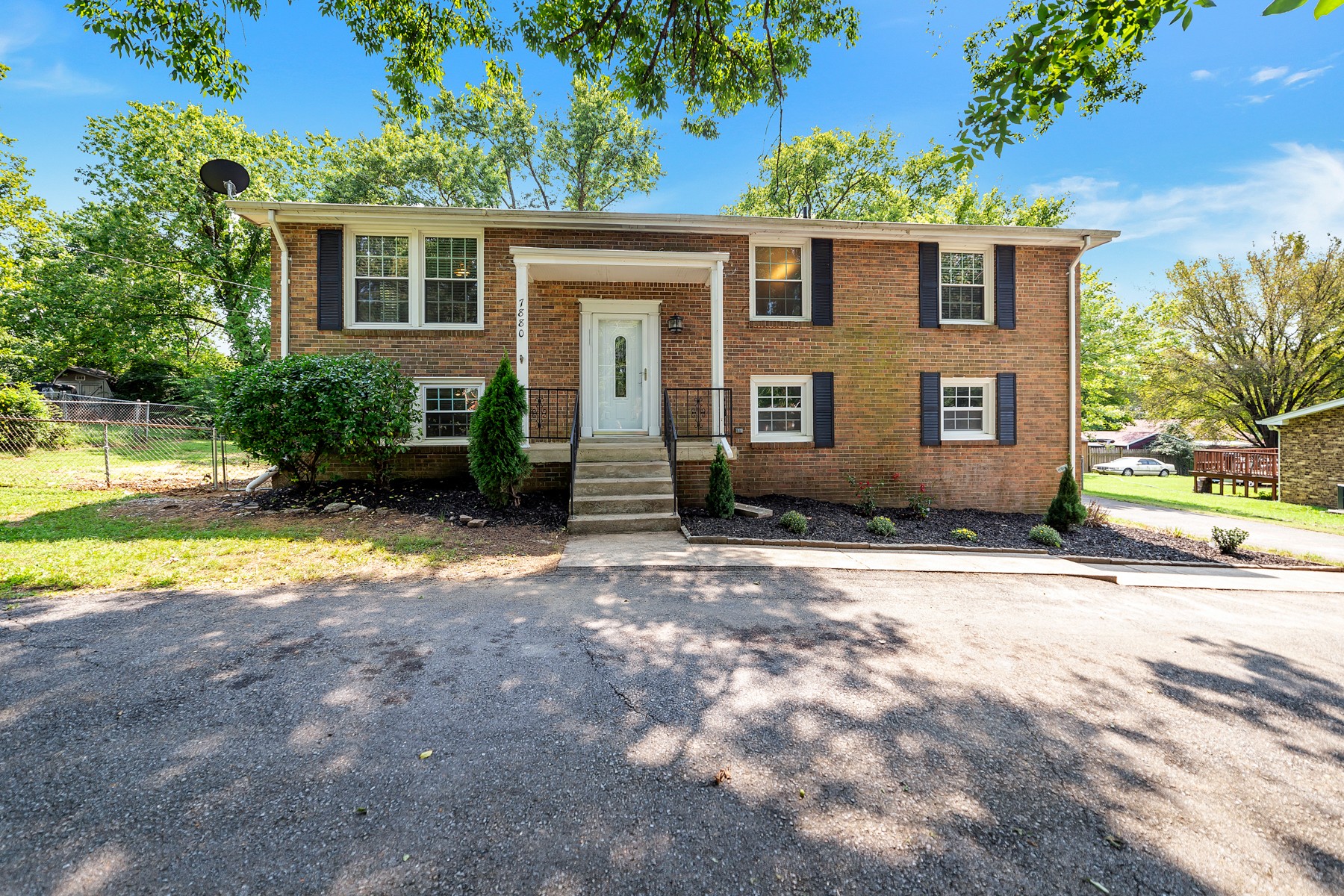 7880 Saundersville Road Mount Juliet, TN 37122 - Photo 20 of 24 front view of a house with a yard