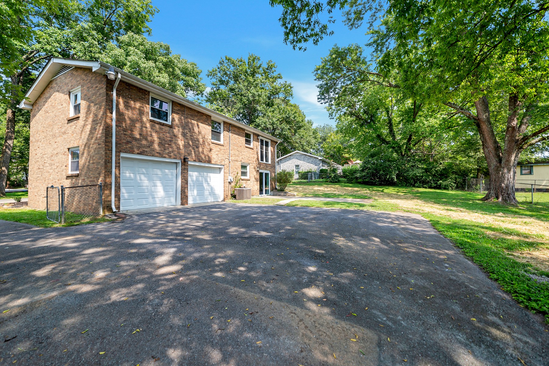 7880 Saundersville Road Mount Juliet, TN 37122 - Photo 22 of 24 a front view of house with yard and green space