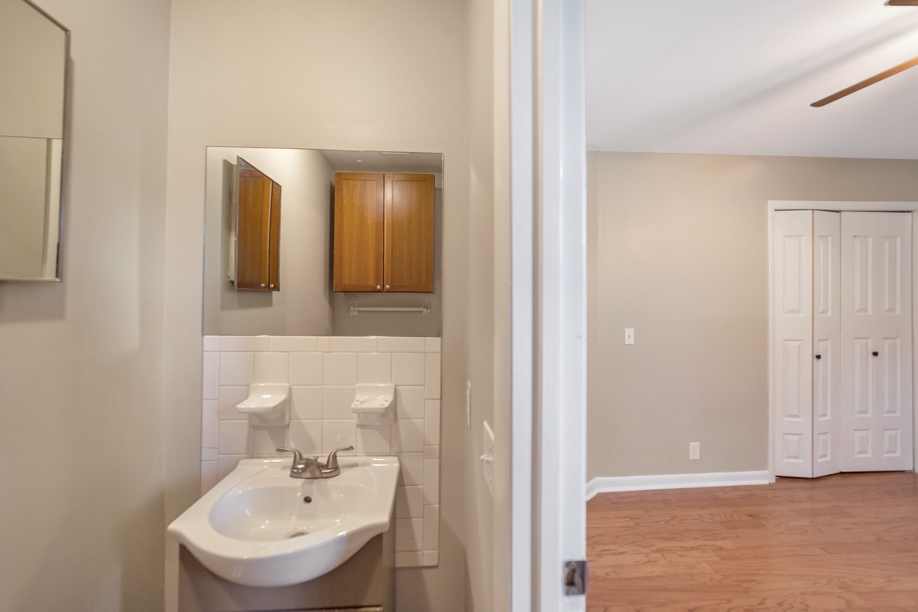 7880 Saundersville Road Mount Juliet, TN 37122 - Photo 8 of 24 a bathroom with a sink and a mirror
