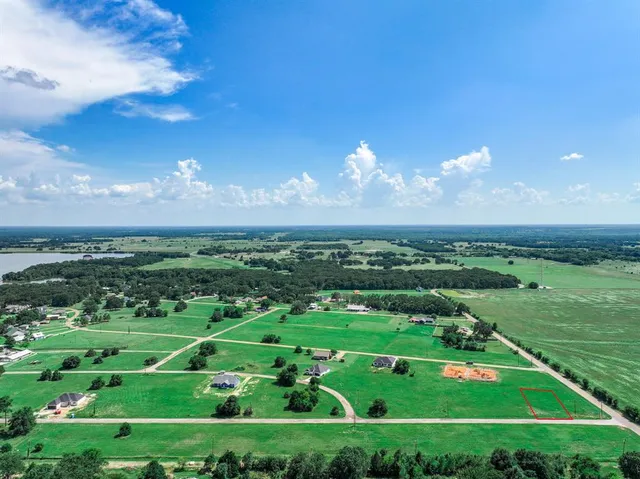 a view of a city with a big yard