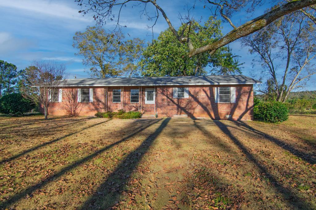 30 North G Street Hamilton, GA 31811 - Photo 1 of 35 a view of a house with backyard and wooden fence