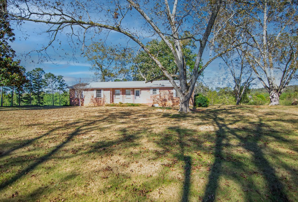 30 North G Street Hamilton, GA 31811 - Photo 2 of 35 a view of swimming pool with a yard