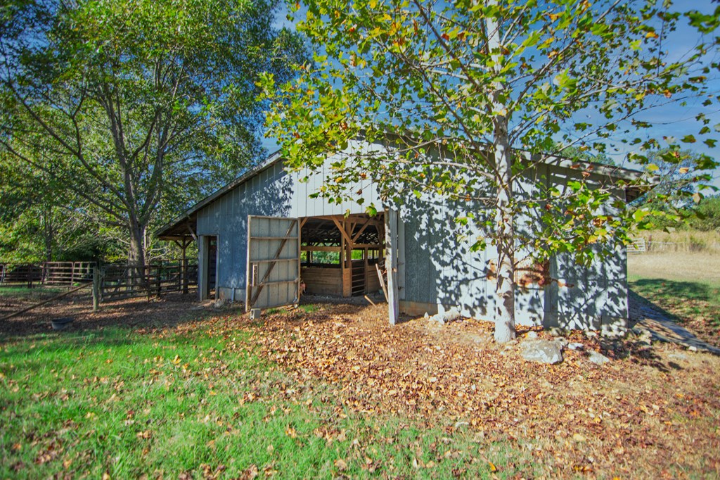 30 North G Street Hamilton, GA 31811 - Photo 24 of 35 a front view of a house with a yard