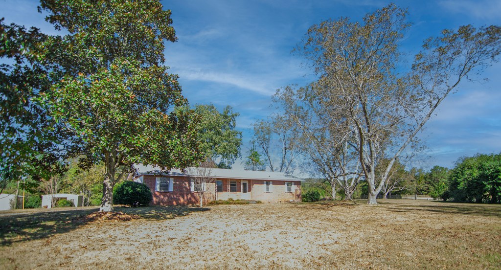 30 North G Street Hamilton, GA 31811 - Photo 34 of 35 front view of a house with a yard