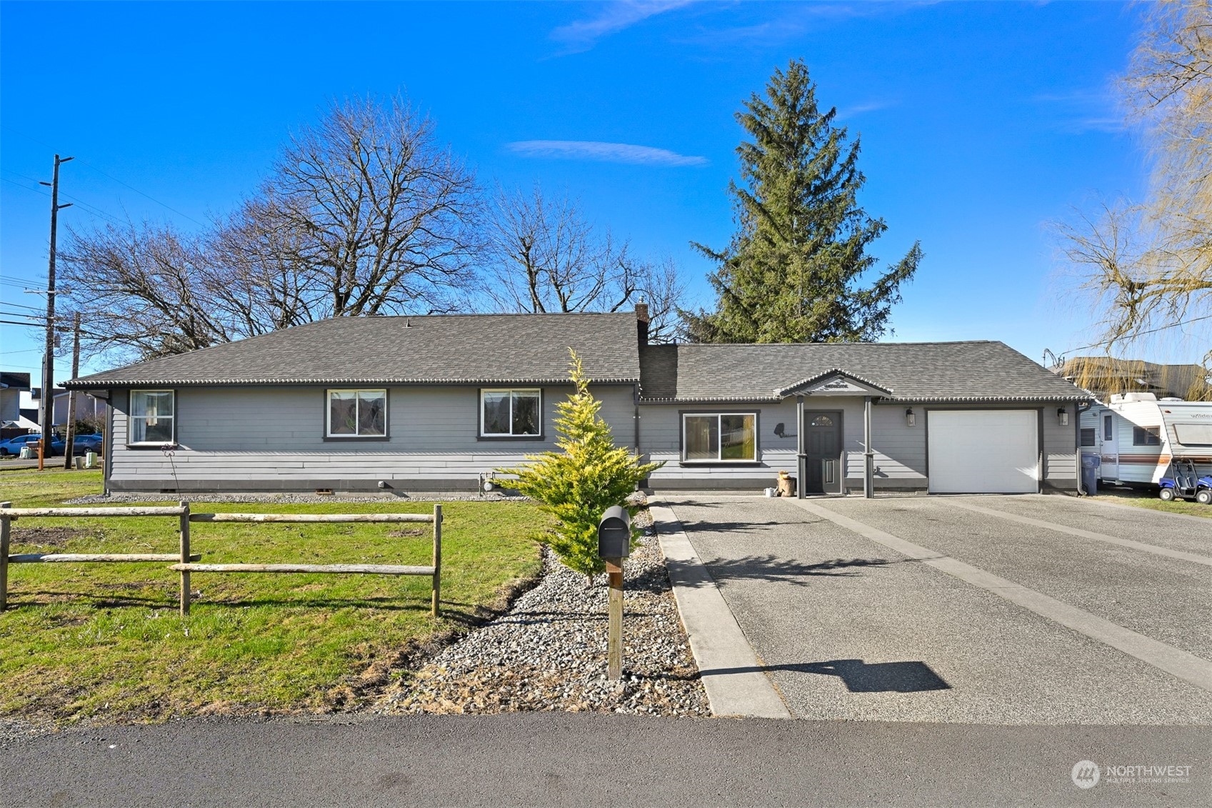 244 Front Street Sumas, WA 98295 - Photo 1 of 40 a front view of a house with a garden