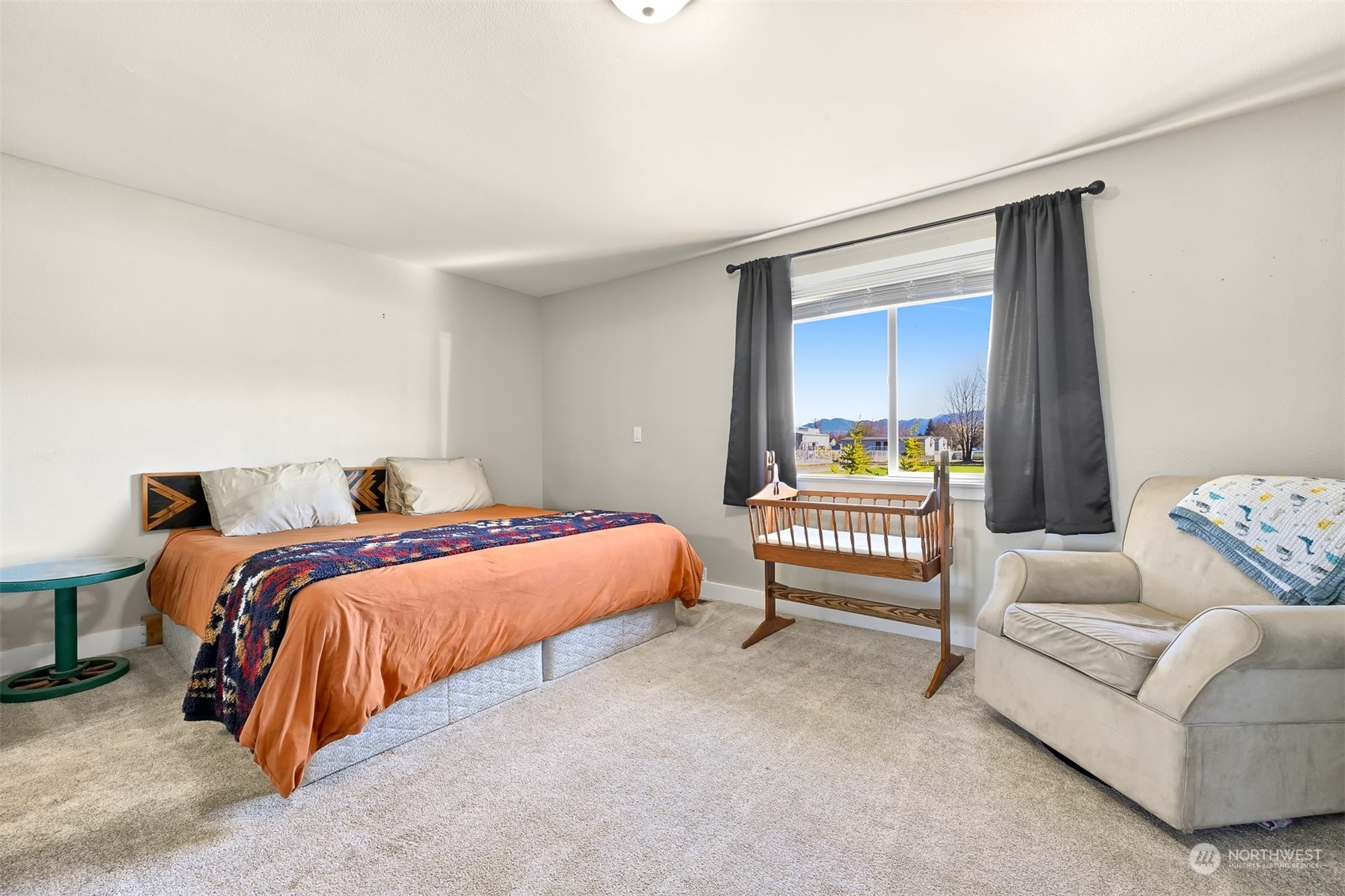 244 Front Street Sumas, WA 98295 - Photo 6 of 40 a bedroom with a bed and a couch