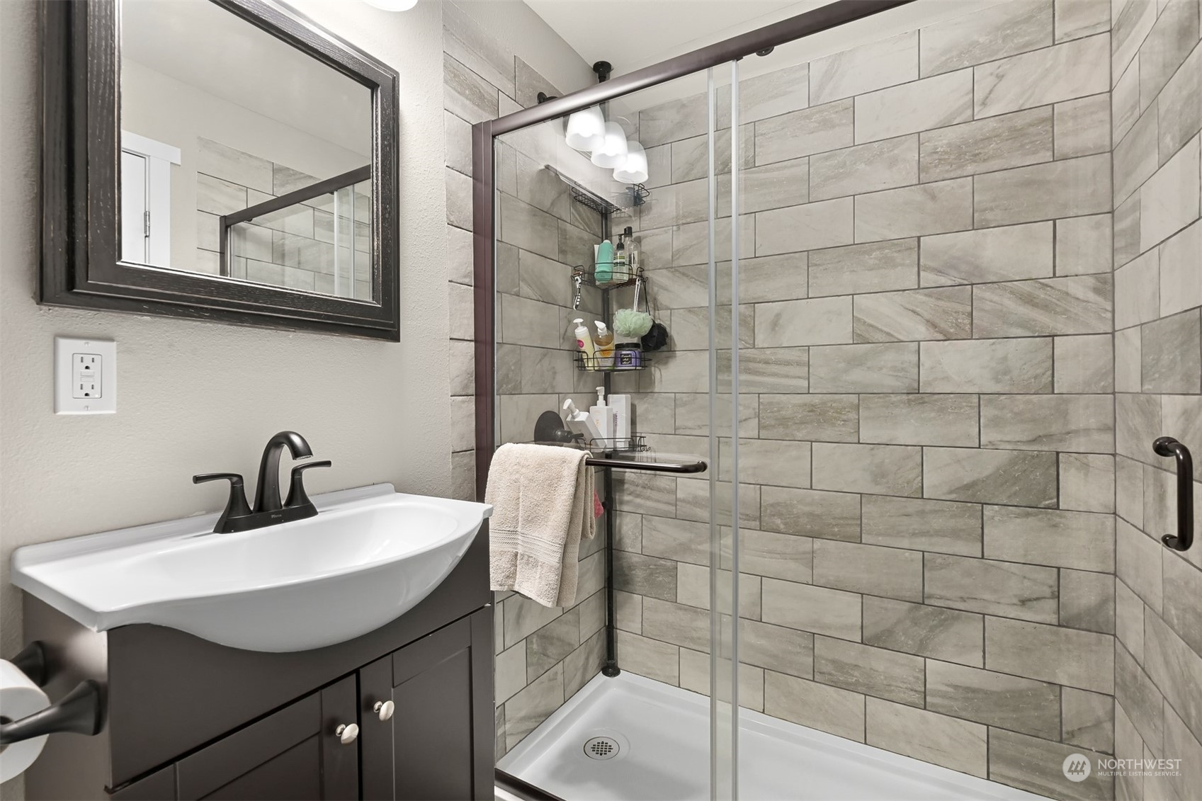 244 Front Street Sumas, WA 98295 - Photo 8 of 40 a bathroom with a sink a mirror and shower