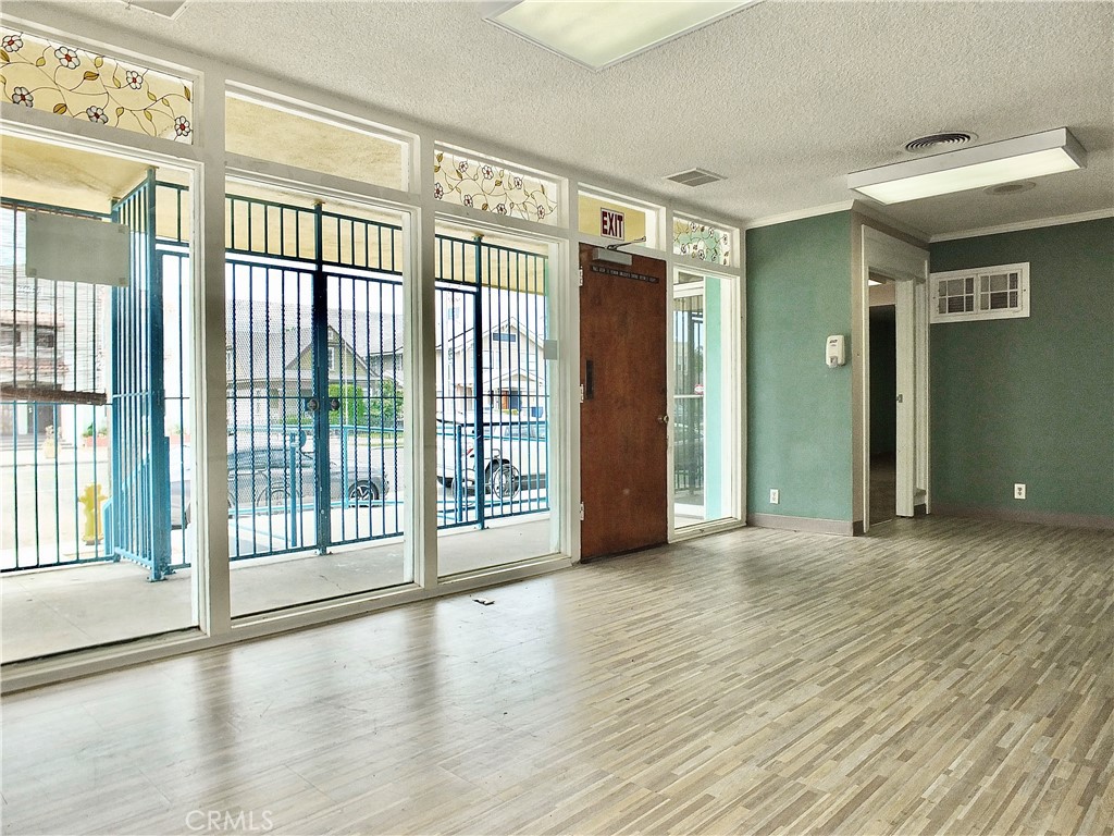 830 Atlantic Avenue Long Beach, CA 90813 - Photo 19 of 75 a view of an empty room with glass door