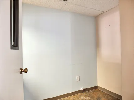 a bathroom with a toilet and a sink