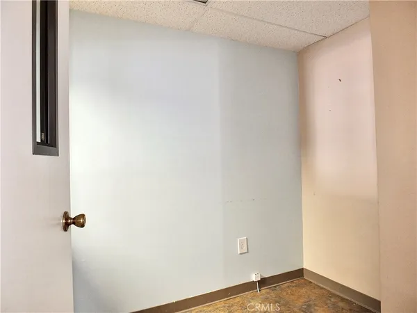 a bathroom with a toilet and a sink