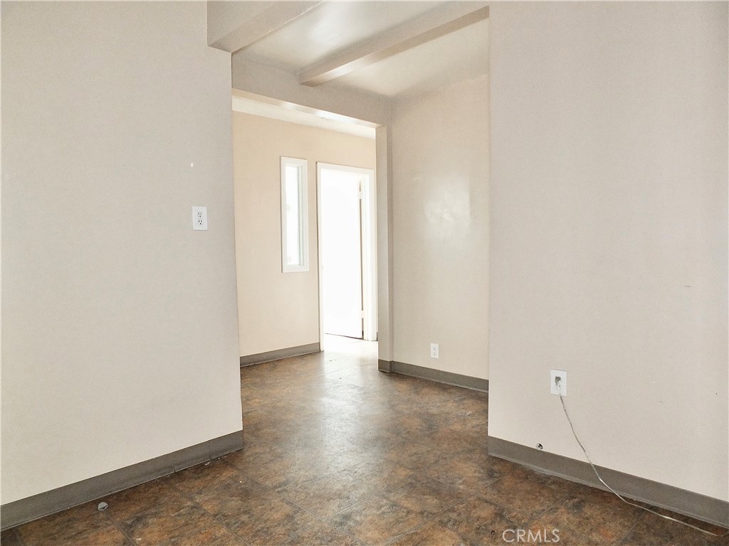 830 Atlantic Avenue Long Beach, CA 90813 - Photo 57 of 75 a view of an empty room with wooden floor