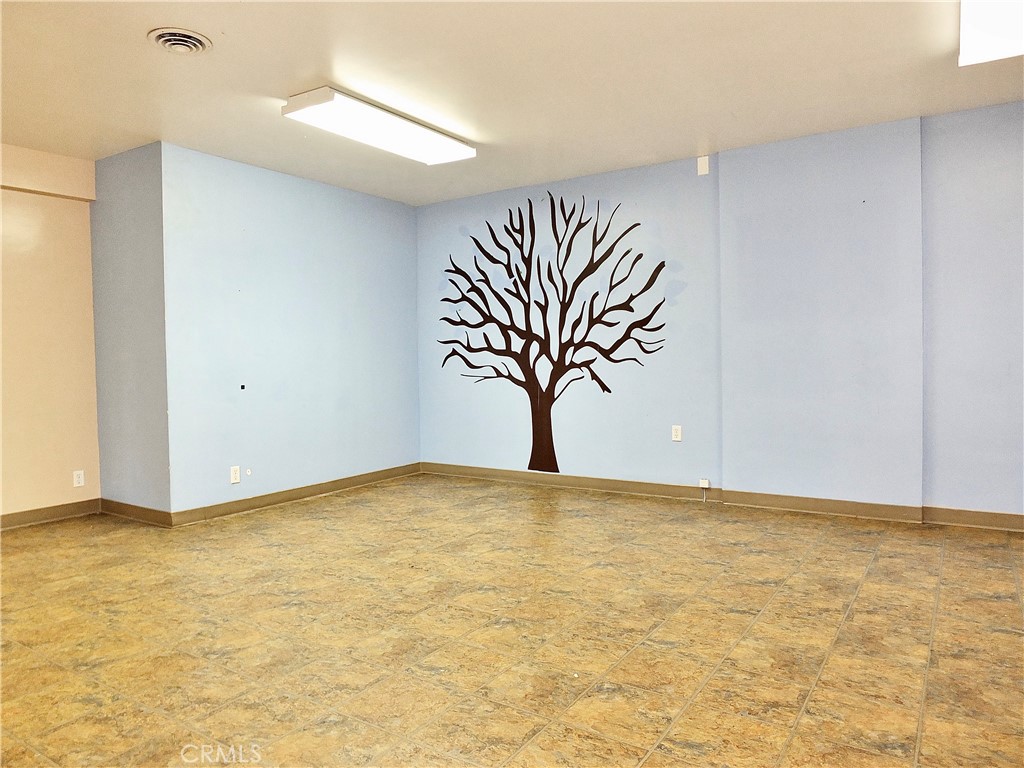 830 Atlantic Avenue Long Beach, CA 90813 - Photo 58 of 75 a view of empty room with window and wooden floor