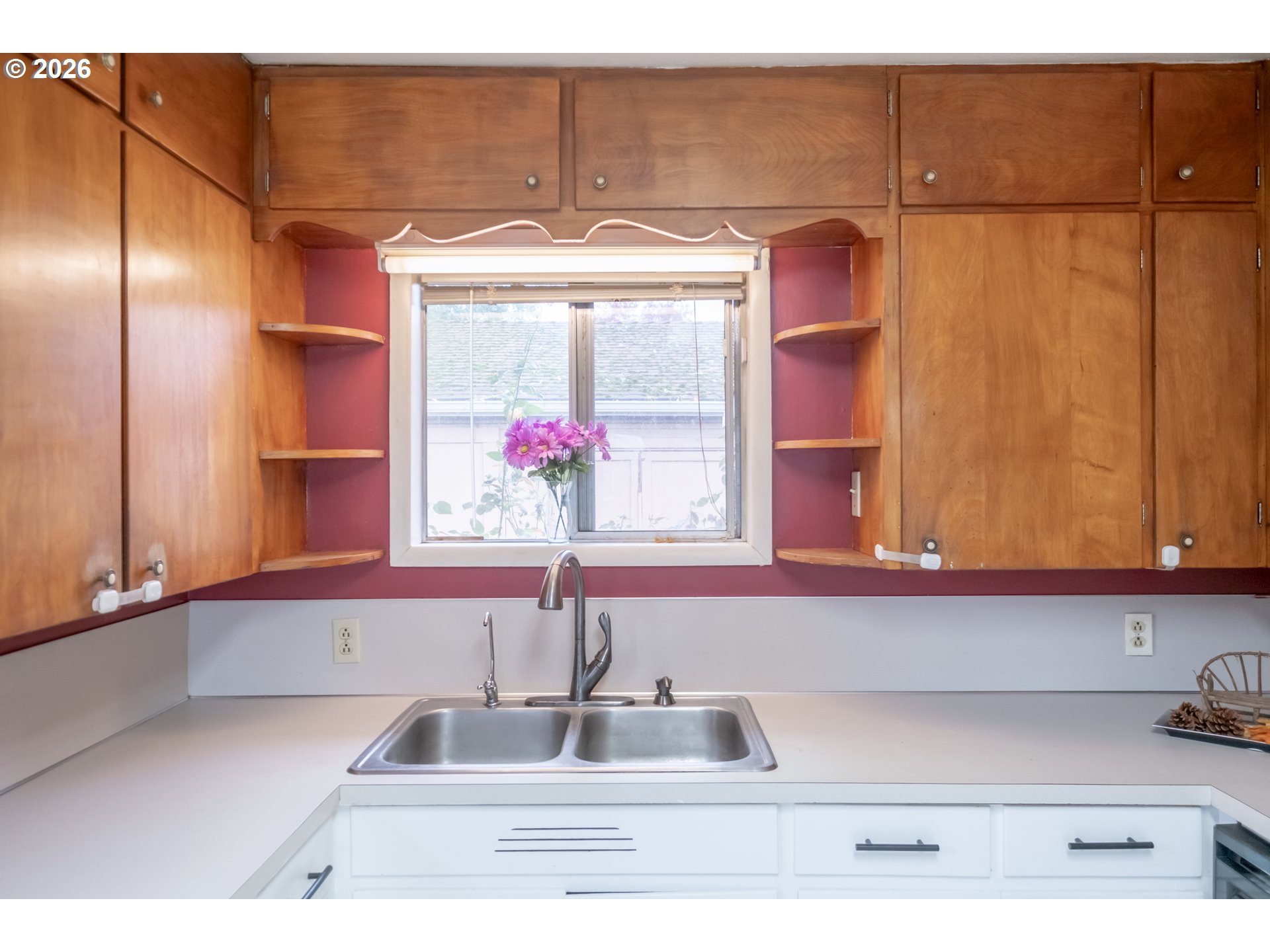 240 South 7th Street Lebanon, OR 97355 - Photo 14 of 27 a kitchen with a sink and cabinets