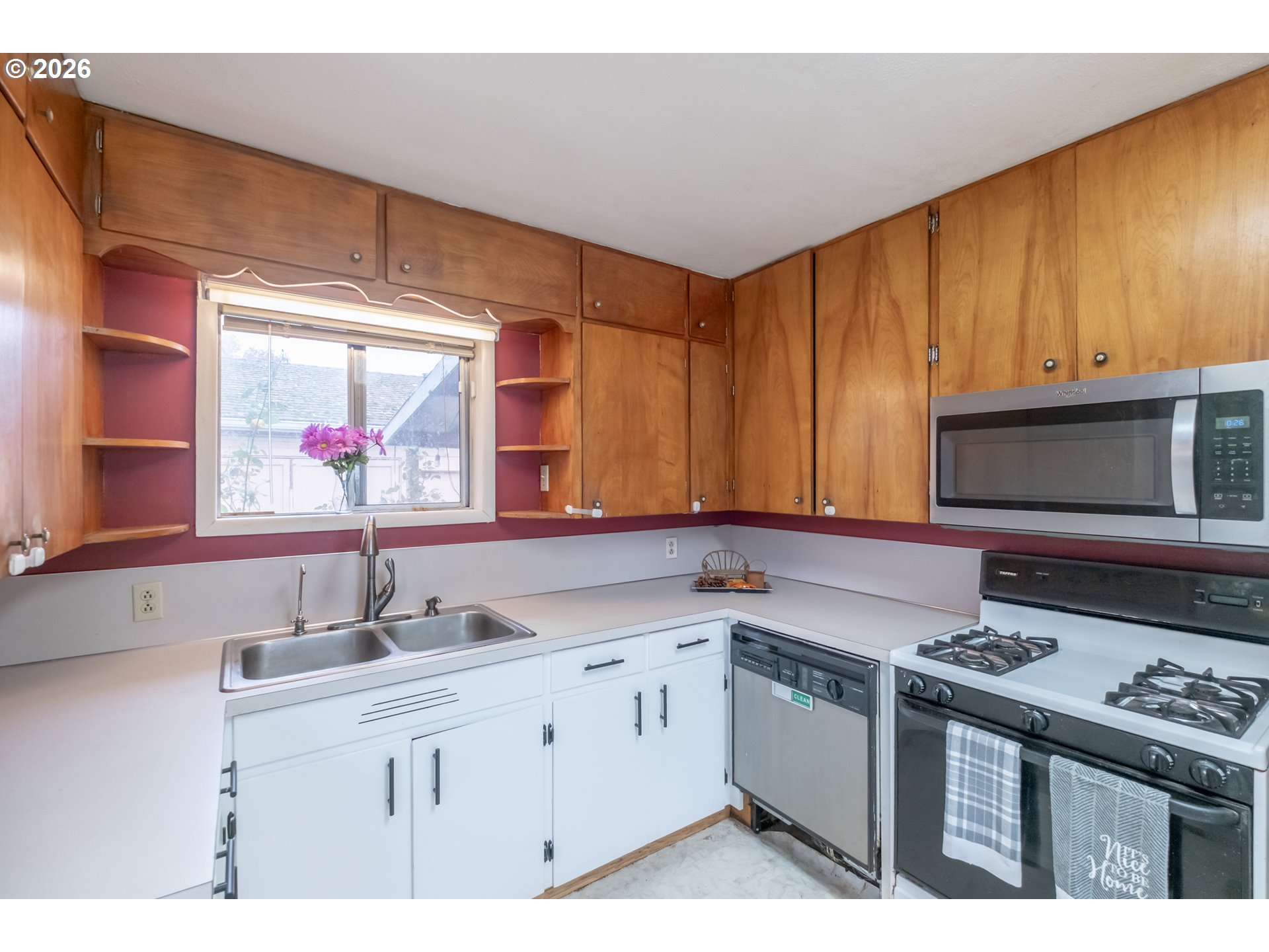 240 South 7th Street Lebanon, OR 97355 - Photo 17 of 27 a kitchen with stainless steel appliances granite countertop a sink stove and cabinets
