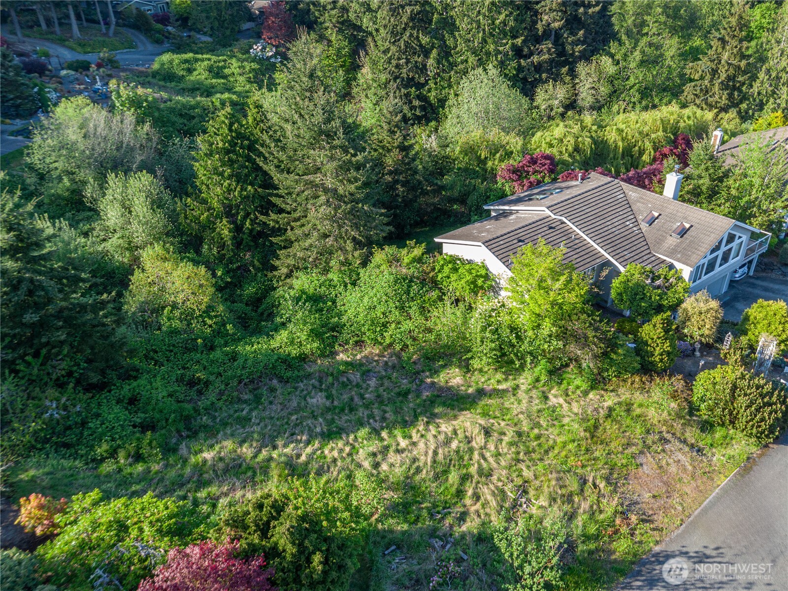 37 Jackson Lane Port Ludlow, WA 98365 - Photo 3 of 10 an aerial view of house with yard and outdoor seating