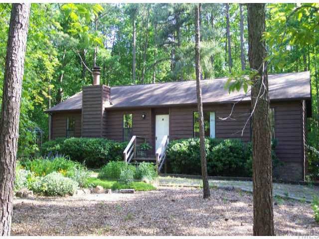 5909 Crabapple Road Durham, NC 27712 - Photo 1 of 1 a view of a house with a yard