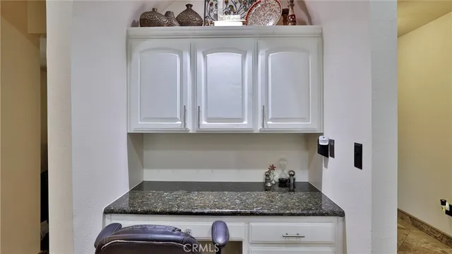 a bed room with a bed and a dresser