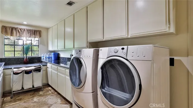 a bedroom with a bed and furniture