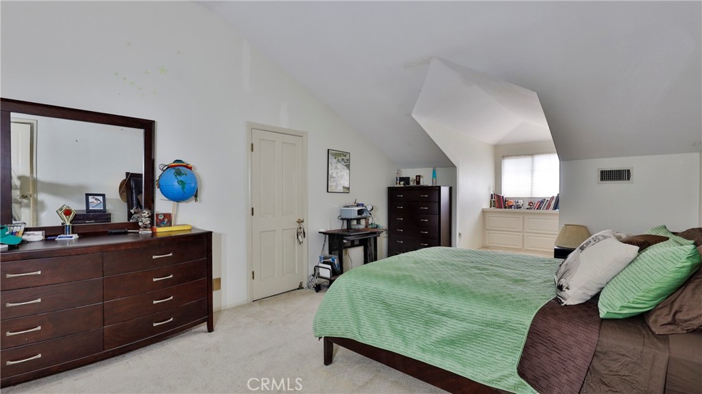 12698 La Solana Drive Redlands, CA 92373 - Photo 36 of 65 a bedroom with a bed and a dresser in it