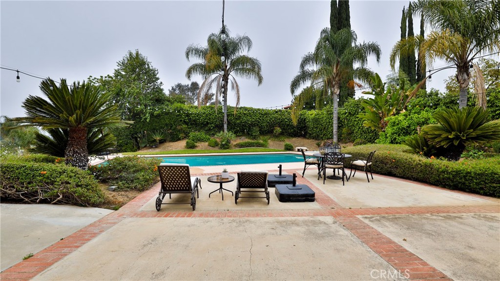 12698 La Solana Drive Redlands, CA 92373 - Photo 41 of 65 a view of a sitting area with furniture and garden