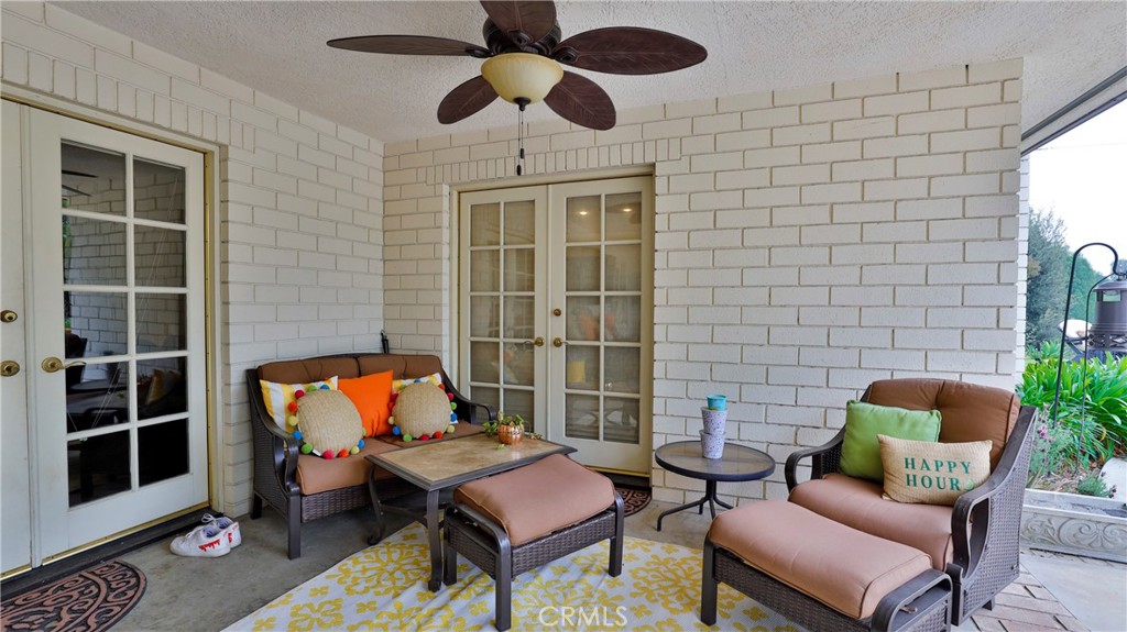 12698 La Solana Drive Redlands, CA 92373 - Photo 42 of 65 a outdoor living space with furniture and a potted plant