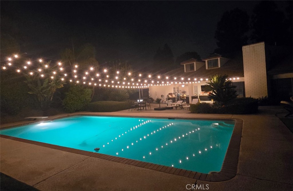 12698 La Solana Drive Redlands, CA 92373 - Photo 55 of 65 a view of a swimming pool with an outdoor space