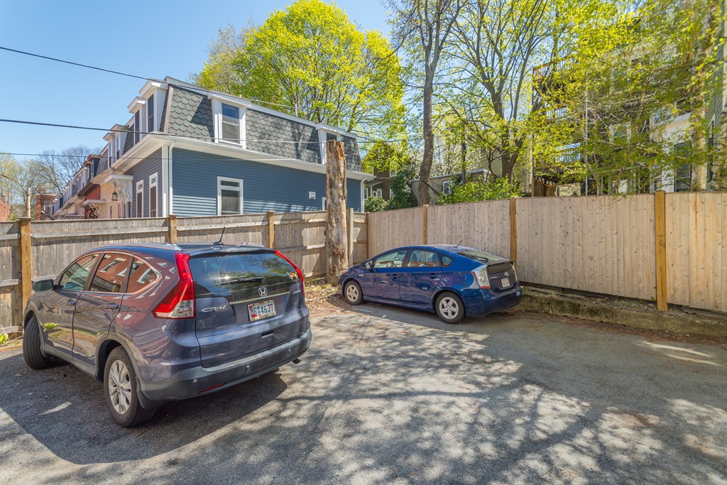 23 Hurd Road, Unit 1 Brookline, MA 02445 - Photo 12 of 12 a car parked in front of a house