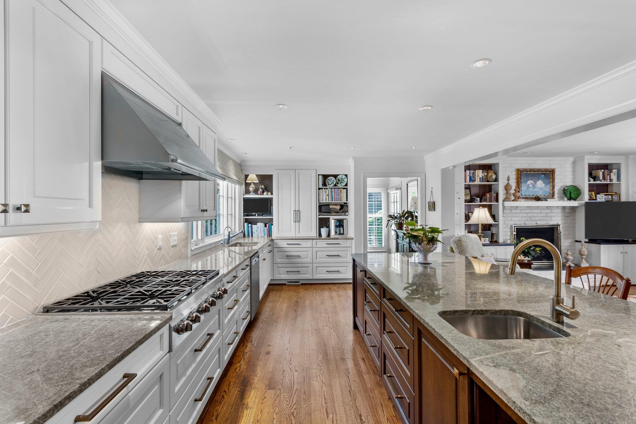 2217 St Marys Street Raleigh, NC 27608 - Photo 11 of 52 Dacor stainless steel appliances including double wall ovens and dishwasher. Sub zero refrigerator as well. Nook at the end makes a wonderful tea/coffee station.