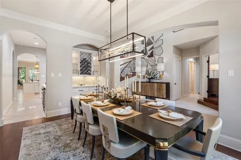 a view of a dining room and livingroom with furniture