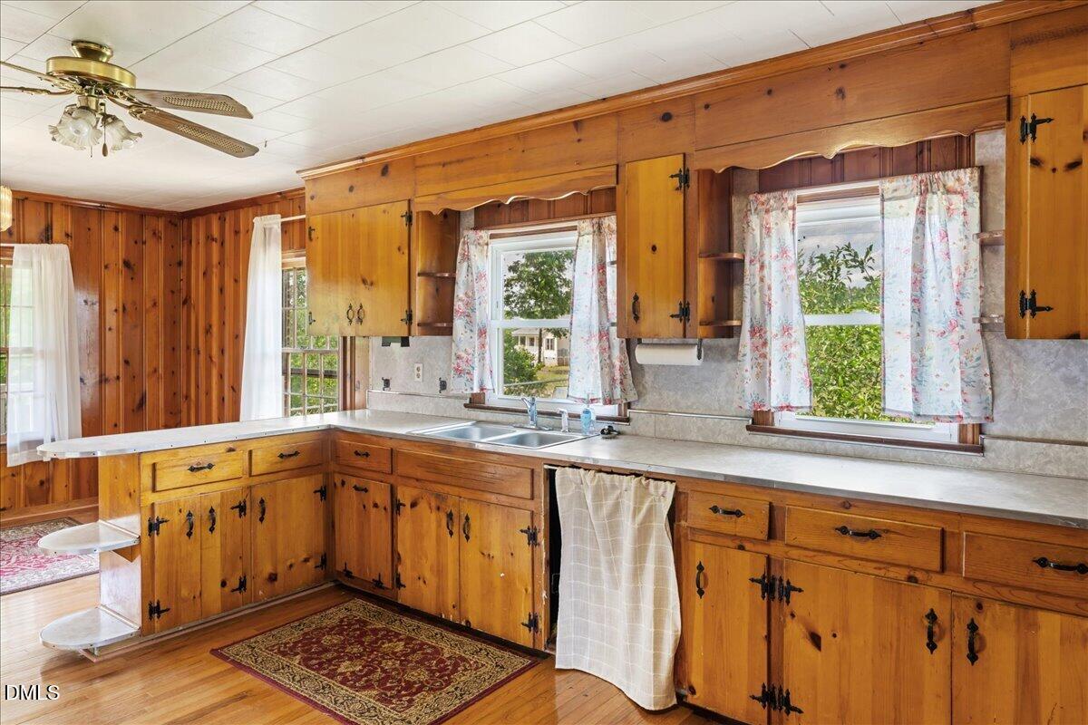 109 Little Ponderosa Road Macon, NC 27551 - Photo 10 of 32 a large kitchen with a large window