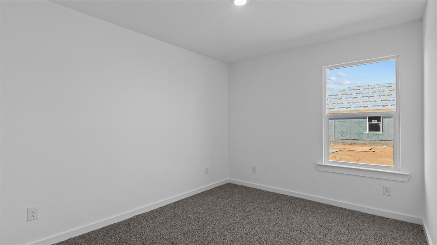 7448 8th Street Lubbock, TX 79416 - Photo 11 of 22 an empty room with a window