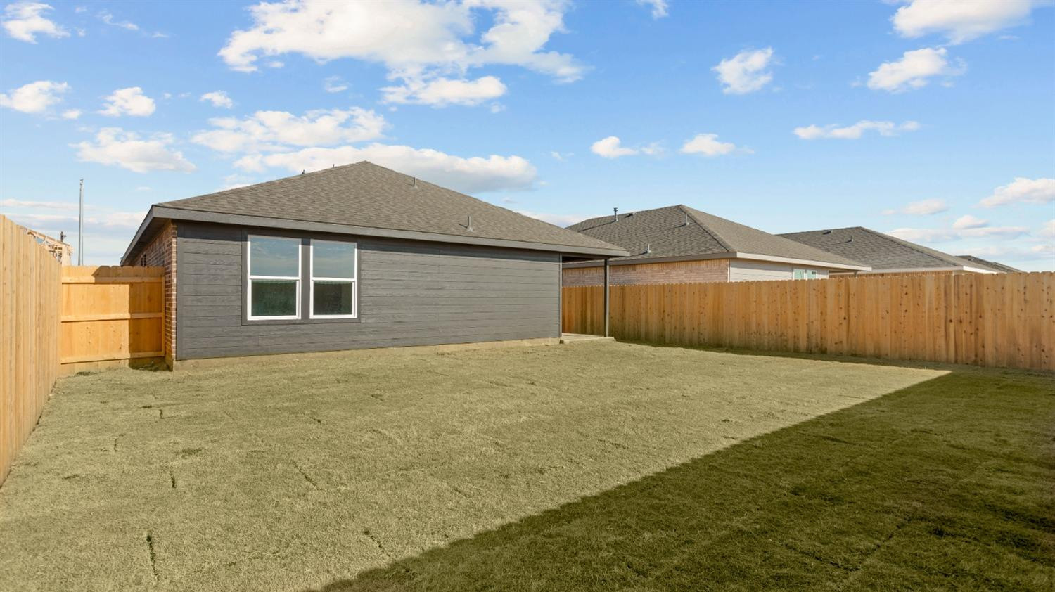 7448 8th Street Lubbock, TX 79416 - Photo 21 of 22 a house with yard in front of it