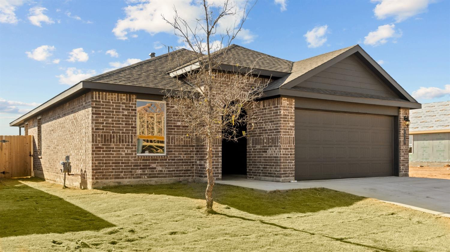 7448 8th Street Lubbock, TX 79416 - Photo 3 of 22 a front view of a house