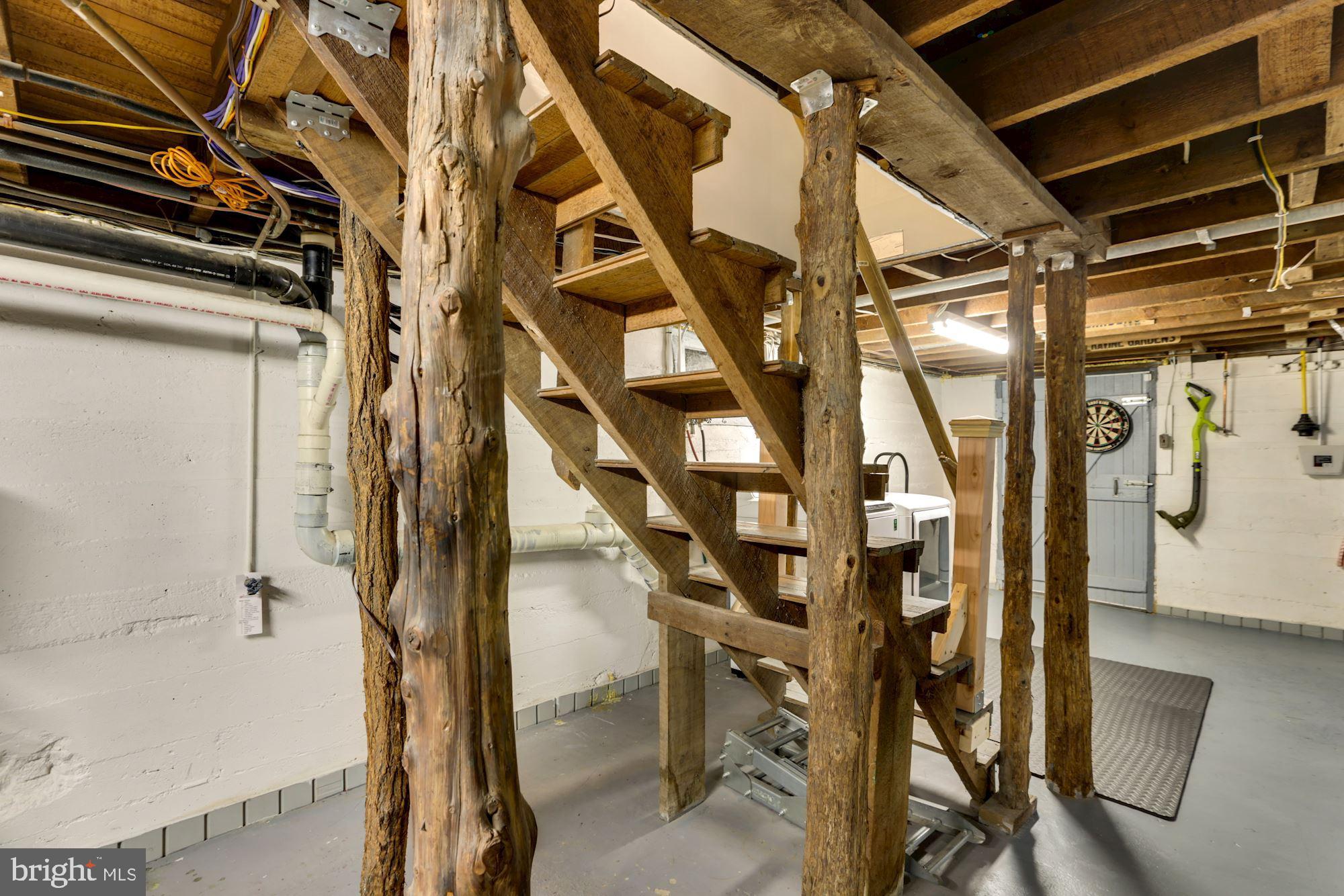 7921 Tire Swing Road Dunn Loring, VA 22027 - Photo 44 of 54 Surprising detail - timber posts in basement